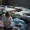  Depuis le debut de la guerre en Ukraine, des centaines de refugies affluent quotidiennement dans les centres d accueil de la ville de Dnipro. Si au debut ils venaient de tout l Est du pays, aujourd hui ils viennent principalement de la region du Donbass. Dnipro, le 24 mai 2022. Photographie par Fiora Garenzi / Hans Lucas.