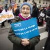 Des membres du Mouvement Laudato Si' présents à la marche pour le climat, le 12/03/2022 à Paris ©Corinne Simon / Hans Lucas