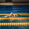 Nageur se baignant dans une piscine municipale. ©Unsplash