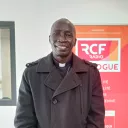 Père Guy Sagna dans les locaux de Dialogue RCF