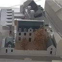 2018 Isabelle Poulain architecte - Maquette de l'ensemble du projet, avec les batiments du 19e siècle devant et les nouvelles extensions à l'arrière plan.