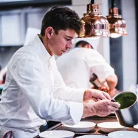 Le chef Jean Sulpice, dans ses cuisines à Talloires.