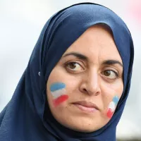 Une supporter de l'équipe de France à la finale de l'Euro 2016 au Stade de France, Saint-Denis, le 10/07/2016 ©PATRIK STOLLARZ / AFP