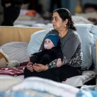 Réfugiés ukrainiens accueillis en Moldavie, le 13/03/2022 ©GIL COHEN-MAGEN / AFP