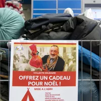 Collecte de vêtements chauds pour les personnes sans-abris, organisée par la communauté Sant'Egidio, le 11/12/2021 ©Corinne Simon / Hans Lucas