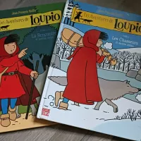 Deux albums de la bande dessinée Loupio de Jean-François Kieffer