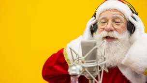pere noel qui chante
