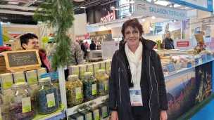 Marie-Agnès Petit, présidente du conseil départemental de Haute-Loire devant le stand du département au Salon de l'agriculture © Martin Obadia