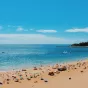 Touristes sur une plage au Portugal ©Photo by Dahee Son on Unsplash