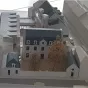 2018 Isabelle Poulain architecte - Maquette de l'ensemble du projet, avec les batiments du 19e siècle devant et les nouvelles extensions à l'arrière plan.