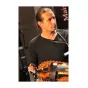 Titre de Galaxie musique sur fond orange de rubrique Culture avec en illustration centré et droite une vielle marron sur un ensemble de flûtes traditionnelles épaisses en bois