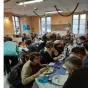 Titre Les Apartés du Secours catholique sur fond rose de rubrique Vie spirituelle avec logo du Secours catholique Caritas France centré en bas