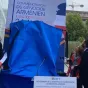La bâche dévoilée. DR