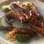 Le Poulpe rôti, poivron confit, condiment vert de Lucien Keff