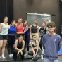 Galaad Sellin, chef du projet "Festival Mosaic" en compagnie des artistes de cirque.